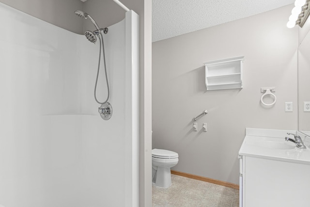 101 Bridgewater Trl, Hudson, WI 54016 - full bath featuring a shower, vanity, toilet, and a textured ceiling