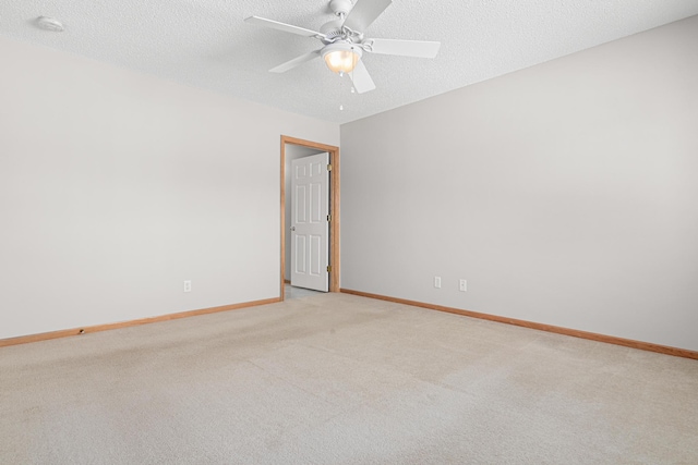101 Bridgewater Trl, Hudson, WI 54016 - spare room with light carpet, ceiling fan, and baseboards