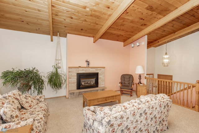 carpeted living room featuring vaulted ceiling with beams, a brick fireplace, and wooden ceiling