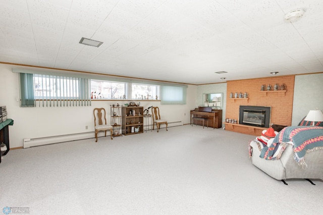 living room with carpet floors, a brick fireplace, and plenty of natural light