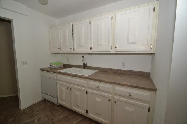 kitchen featuring white cabinetry, dishwasher, and sink