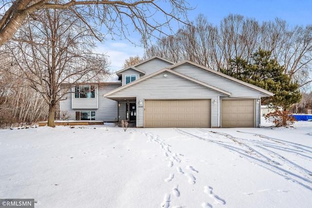 view of front of property with a garage