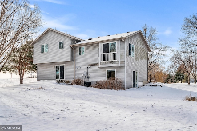 view of snow covered house