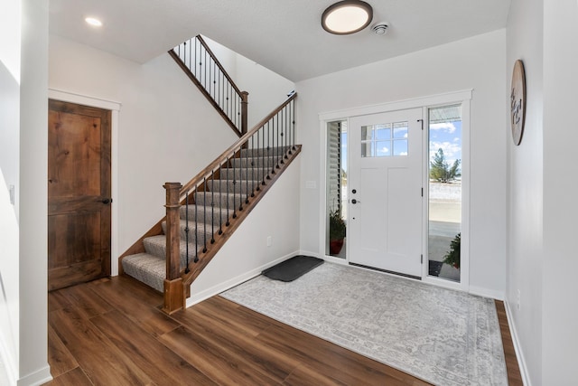 entrance foyer with dark wood-type flooring