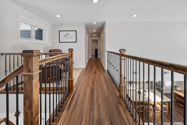 hallway with wood-type flooring