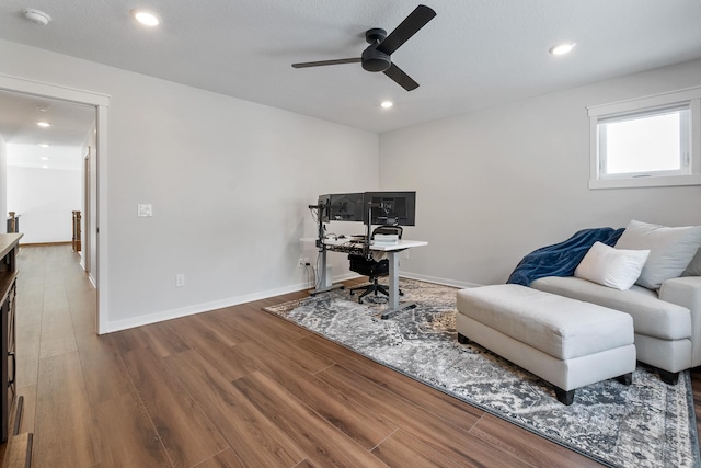 office space with ceiling fan and hardwood / wood-style floors