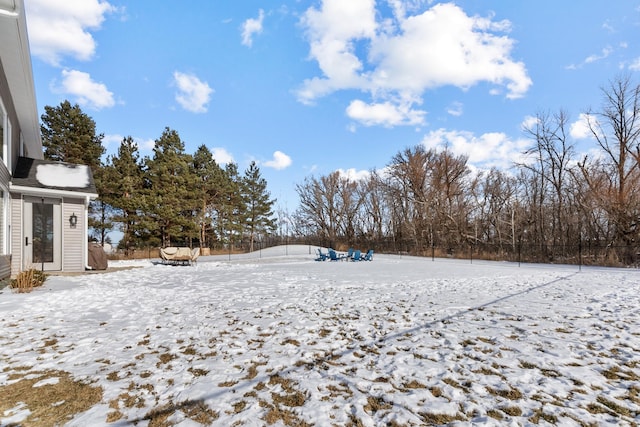 view of yard covered in snow