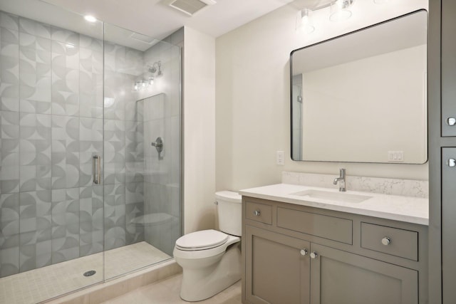 bathroom featuring walk in shower, vanity, and toilet