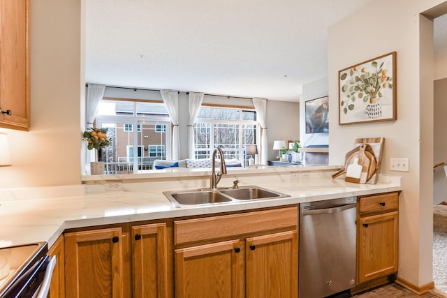 14587 Olivine Way NW, Ramsey, MN 55303 - kitchen featuring dishwasher, a sink, and range with electric stovetop