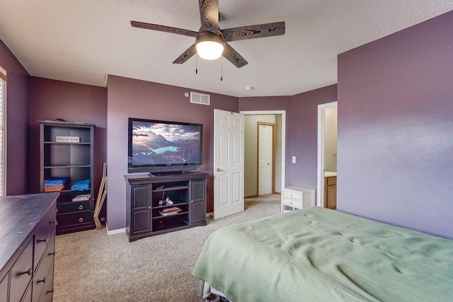 14587 Olivine Way NW, Ramsey, MN 55303 - carpeted bedroom featuring baseboards, a ceiling fan, and a textured ceiling