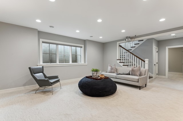 sitting room with light colored carpet