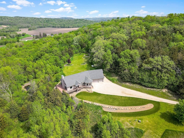 aerial view featuring a forest view