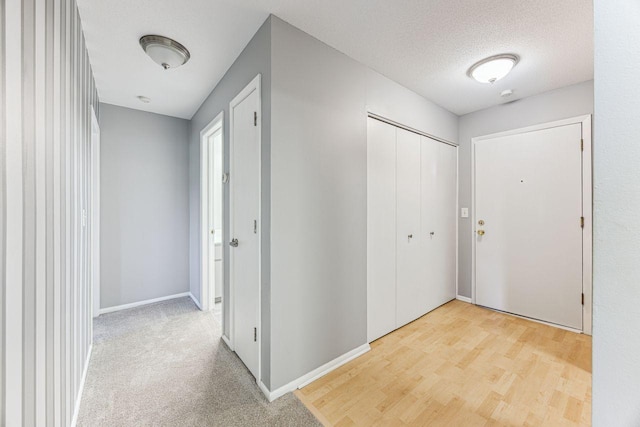 4380 Brookside Ct Unit 116, Edina, MN 55436 - hallway with a textured ceiling and wood finished floors