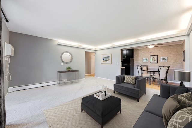 4380 Brookside Ct Unit 116, Edina, MN 55436 - living room featuring a baseboard heating unit, light carpet, and ceiling fan