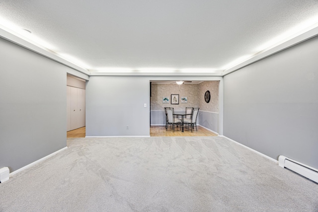4380 Brookside Ct Unit 116, Edina, MN 55436 - carpeted empty room featuring baseboard heating and ceiling fan