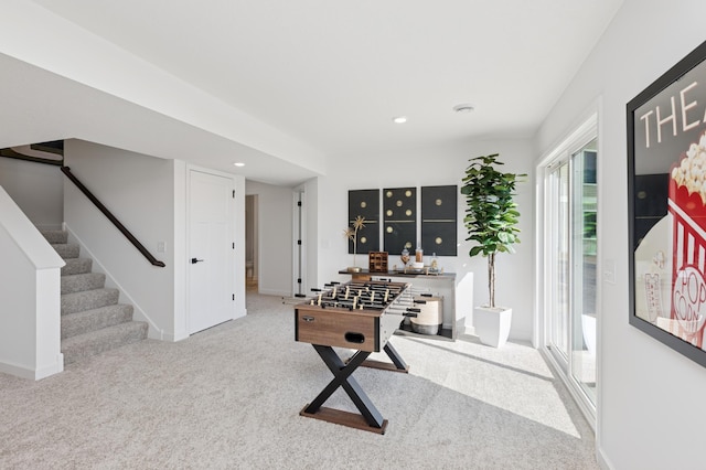 recreation room with carpet, baseboards, and recessed lighting