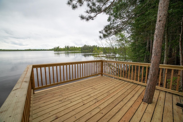 3835 Lake Rd, Barnum Twp, MN 55767 - wooden deck with a water view