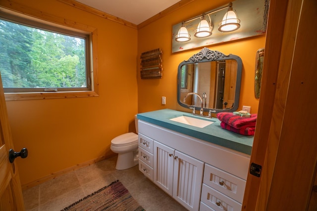 3835 Lake Rd, Barnum Twp, MN 55767 - bathroom featuring toilet, vanity, baseboards, and tile patterned flooring