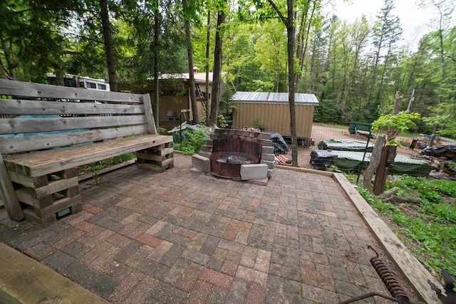 3835 Lake Rd, Barnum Twp, MN 55767 - view of patio with a fire pit