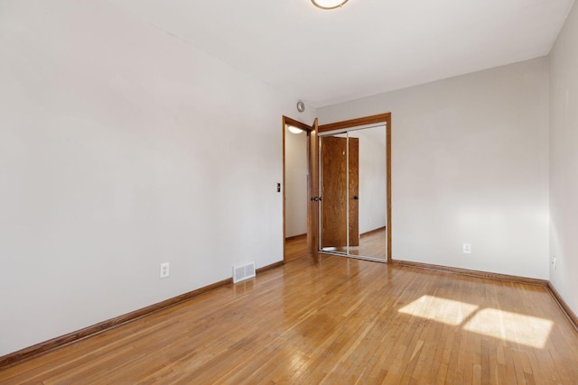 empty room featuring light hardwood / wood-style floors