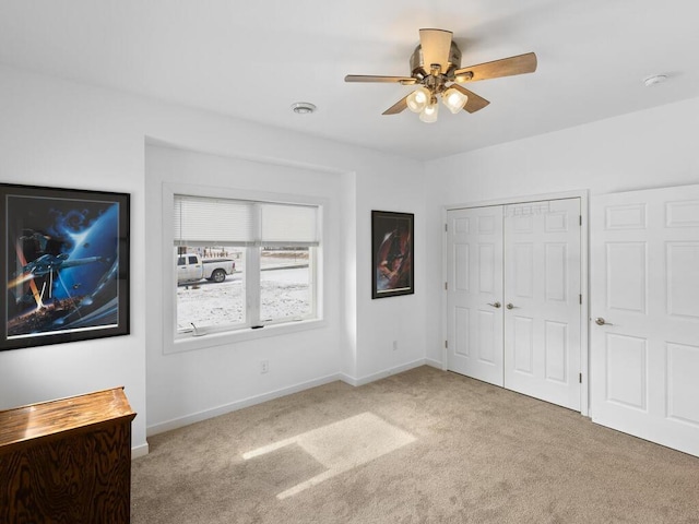 unfurnished bedroom featuring visible vents, baseboards, and carpet floors