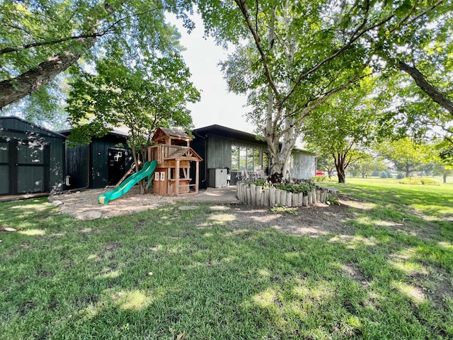 view of yard featuring a playground