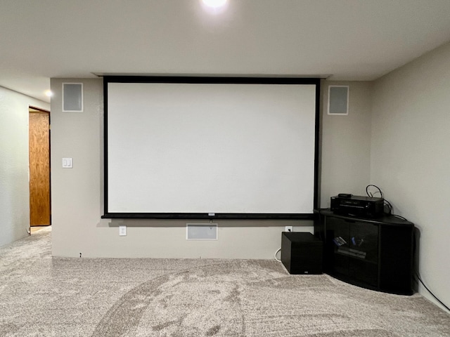 home theater room featuring carpet floors