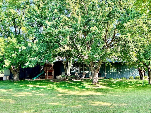 view of yard with a playground