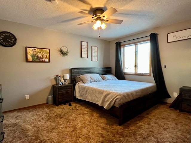 bedroom featuring a textured ceiling, ceiling fan, and carpet