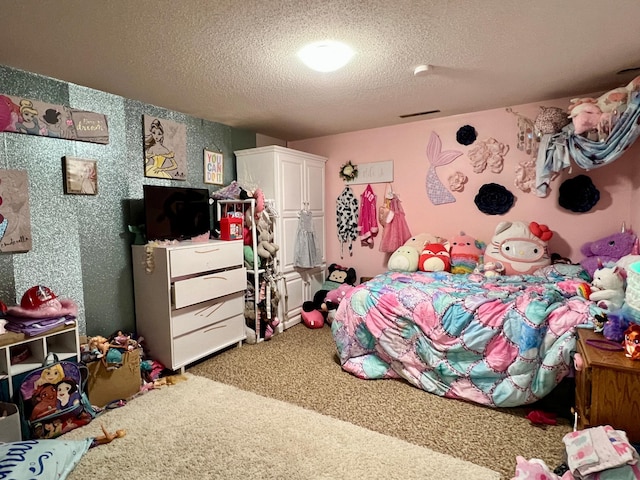 carpeted bedroom with a textured ceiling