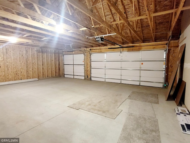 garage featuring a garage door opener