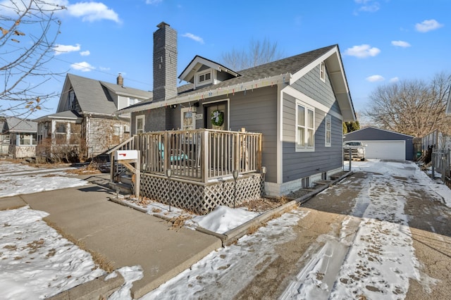 exterior space featuring an outbuilding and a garage