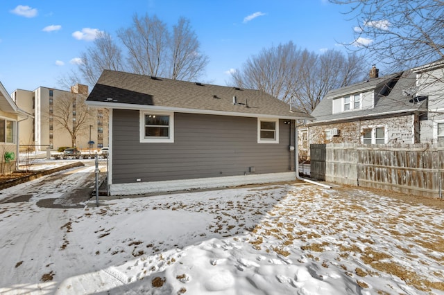 view of snow covered house