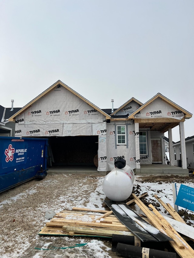 unfinished property with a garage