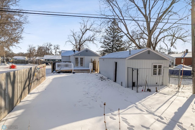 view of snow covered house