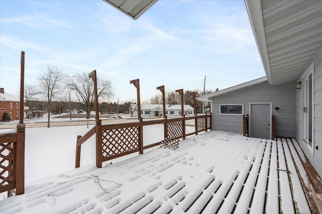 view of snow covered deck