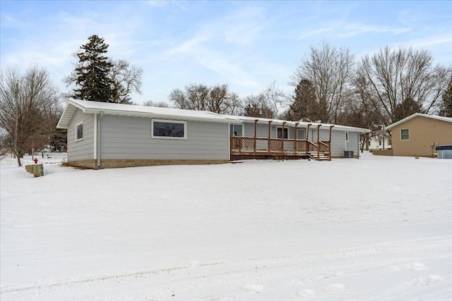 view of front of home with a deck