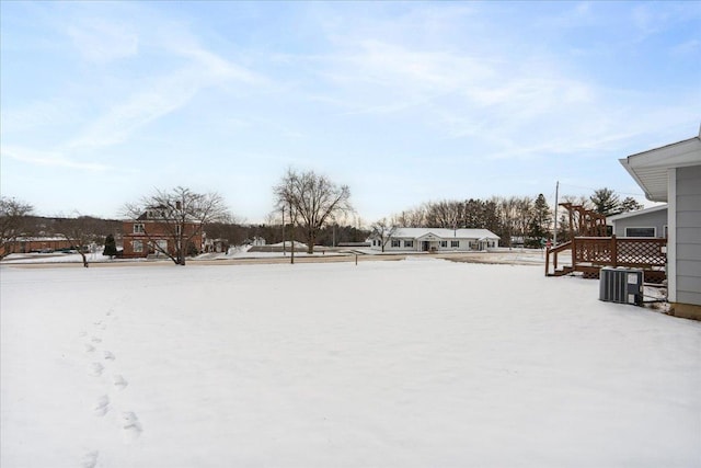 snowy yard with cooling unit