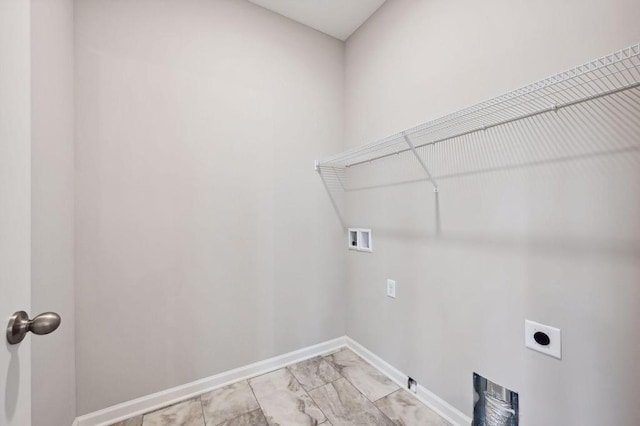 clothes washing area featuring washer hookup and electric dryer hookup