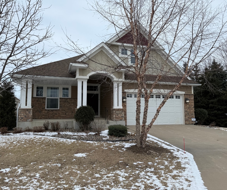 craftsman inspired home with a garage