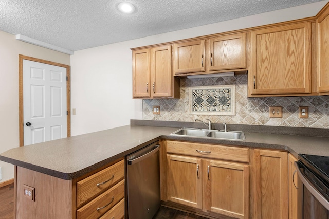 kitchen with tasteful backsplash, sink, stainless steel dishwasher, and kitchen peninsula