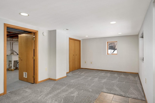 carpeted spare room featuring sink