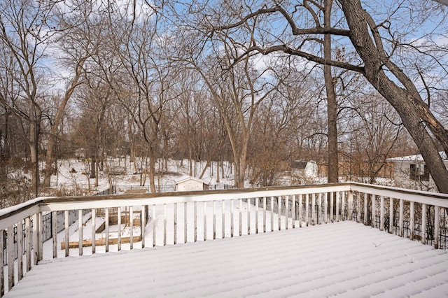 view of snow covered deck