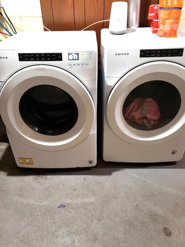 laundry room with separate washer and dryer