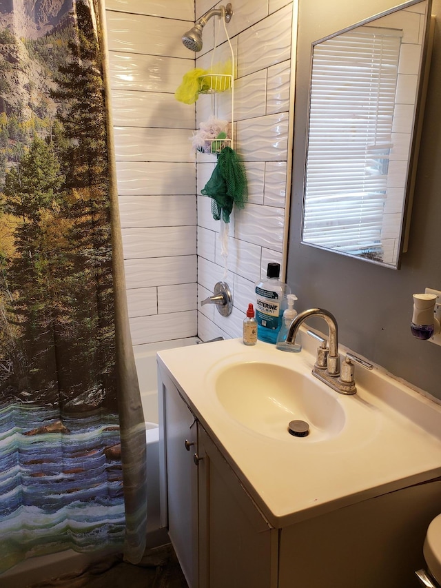 bathroom featuring shower / tub combo with curtain and vanity