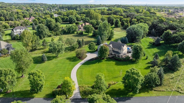 aerial view featuring a view of trees