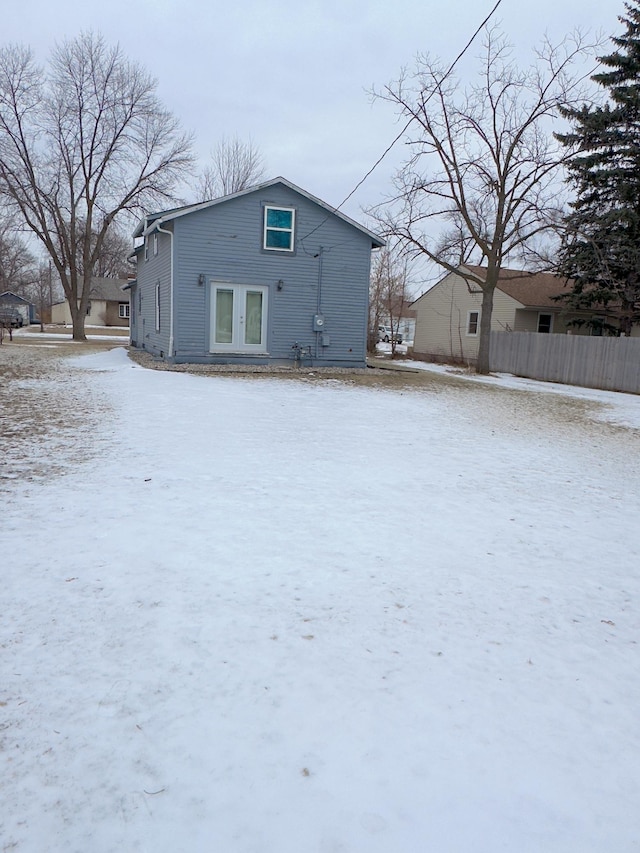 view of snow covered house