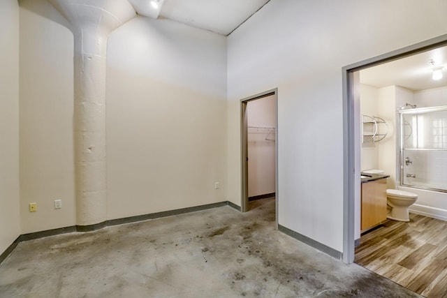 2929 Chicago Ave Unit 1216, Minneapolis, MN 55407 - full bathroom with shower / bath combination and unfinished concrete flooring