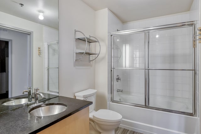 2929 Chicago Ave Unit 1216, Minneapolis, MN 55407 - full bathroom featuring vanity and enclosed tub / shower combo