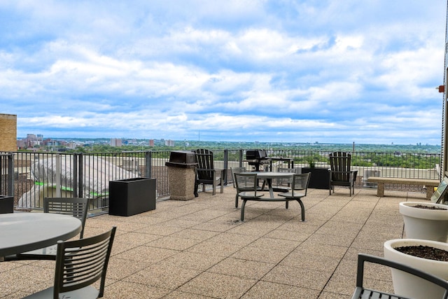 2929 Chicago Ave Unit 1216, Minneapolis, MN 55407 - view of patio featuring area for grilling and outdoor dining area